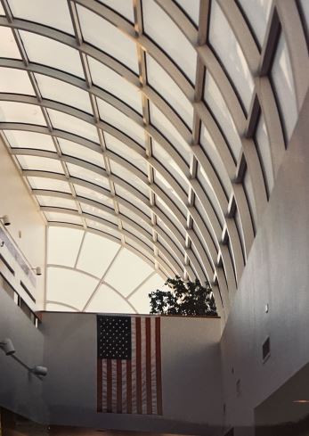 Liberty City Hall photo of a US Flag hanging from the old ceiling Liberty City Hall photo of a US Flag hanging from the old ceiling