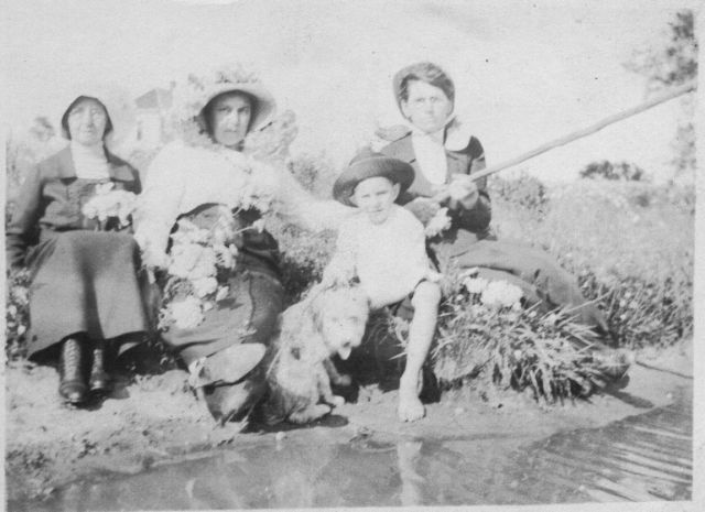 Photograph of family by the water